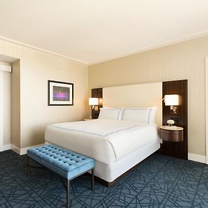 Suite "Fairmont" met een Slaapkamer en een King Size Bed